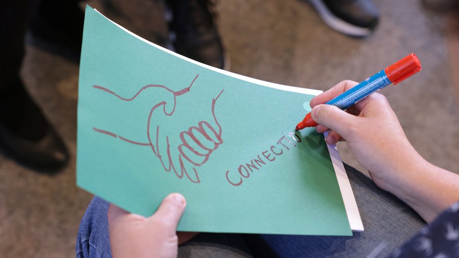 Drawing of a handshake. Underneath it says “Connection.”