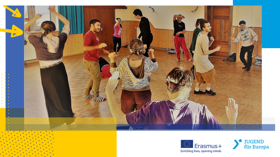 Das Bild zeigt eine tanzende Gruppe von Menschen.