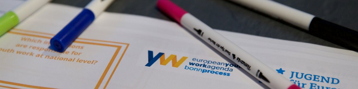 Pens are lying on a table